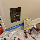 Wall opened for copper pipe rough-in repair